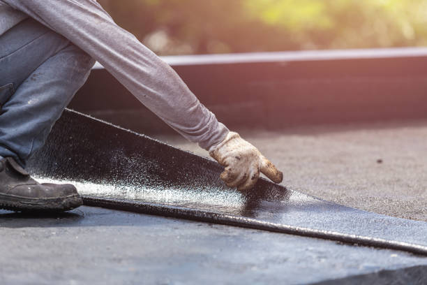 Professional Waterproofing technician working in Townley, AL